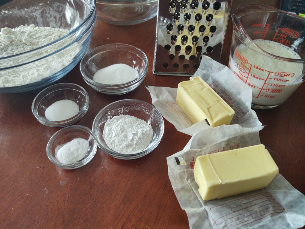 Ingredients for biscuits laid out on a table.