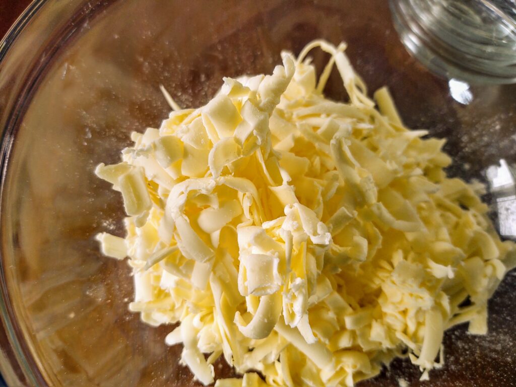 grated cold butter