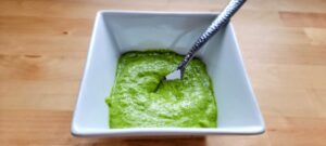 a bowl of freshly made Fresh and Super Easy, Alkaline Herby Creamy Dressing